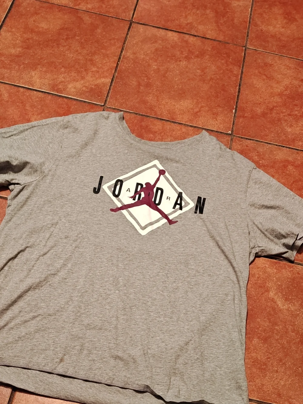 Jordan Men’s Light Gray Short Sleeve Tee with Maroon Jumpman Logo